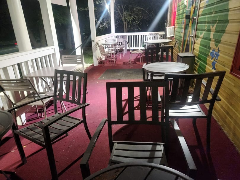 Outdoor patio dining at The Jerk Pit